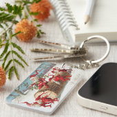 Gnomes dragging a cut tree trunk through the snow キーホルダー (正面右)