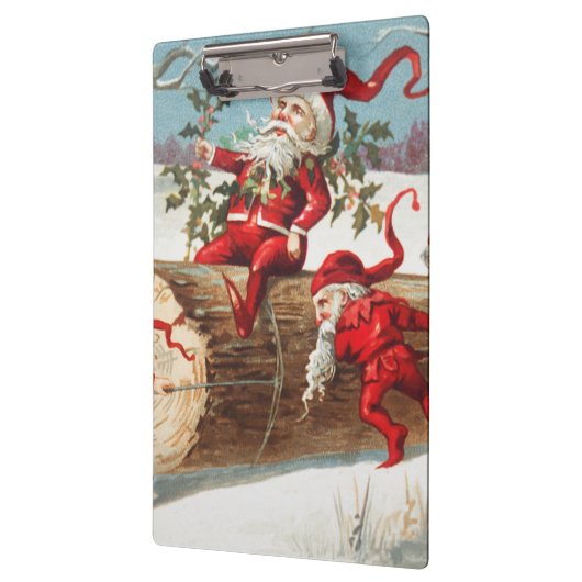 Gnomes dragging a cut tree trunk through the snow クリップボード (左)