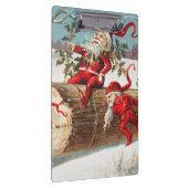 Gnomes dragging a cut tree trunk through the snow クリップボード (右)