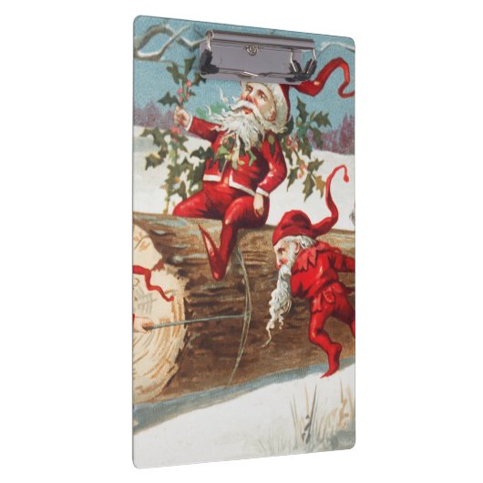 Gnomes dragging a cut tree trunk through the snow クリップボード (右)