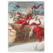 Gnomes dragging a cut tree trunk through the snow クリップボード (正面)