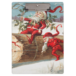 Gnomes dragging a cut tree trunk through the snow クリップボード