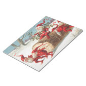 Gnomes dragging a cut tree trunk through the snow ノートパッド (アングル)