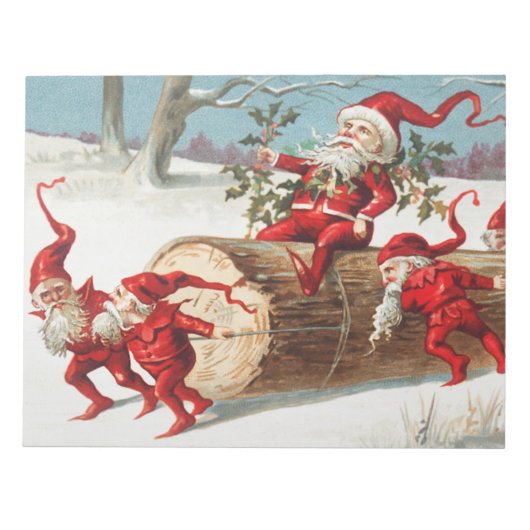 Gnomes dragging a cut tree trunk through the snow ノートパッド (正面)