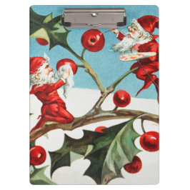 Gnomes painting holly berries in the snow クリップボード