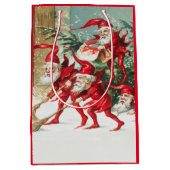 Gnomes sweeping snow with a broom ミディアムペーパーバッグ (正面)