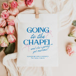 Going to the Chapel Bachelorette Weekend フェイバーバッグ<br><div class="desc">The Going to the Chapel Bachelorette Collection blends playful charm with classic bridal style. Featuring a soft pink background paired with bold blue typography, this suite captures the excitement of a bride-to-be heading down the aisle. Delicate bow illustrations and a mix of elegant serif and flowing script fonts add a...</div>