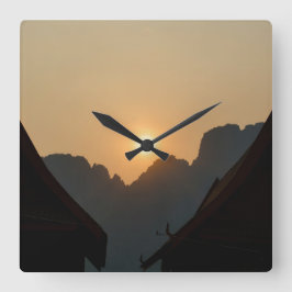 Golden light on the peaks: sunset in Vang Vieng スクエア壁時計