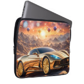 golden luxury car in a desert landscape ラップトップスリーブ (正面右)