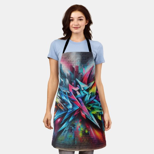 Graffiti Streetart auf Ziegelwand mit Skyline エプロン (着用した状態)