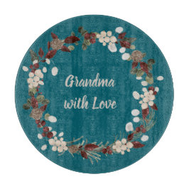 Grandma Christmas wreath on a rich teal  カッティングボード