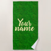 Green grass texture from a soccer field ビーチタオル (正面)