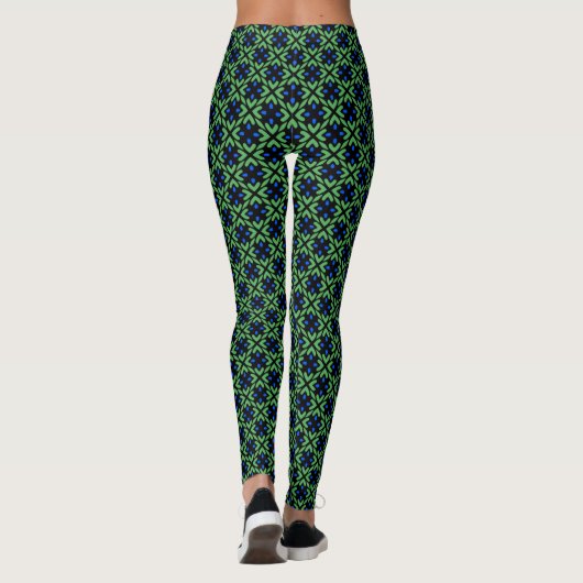 Green leafy pattern with blue petals Leggings レギンス (裏面)