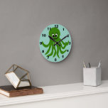 Green Octopus Design ラウンド壁時計<br><div class="desc">This octopus design wall clock is a timekeeping device designed to hang on a wall, serving as both a functional tool and a decorative focal point for a room. Made from acrylic and features a pre-installed backside hanging slot for easy hanging and a non-ticking design. You can customise this wall...</div>