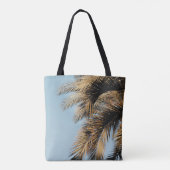 Green palm tree under blue sky in the morning トートバッグ (裏面)