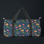 Gremlins™ 80's Retrowave Pattern ダッフルバッグ<br><div class="desc">Bring the party (and the chaos) with this vibrant Gremlins™ all-over pattern design! Featuring fan-favorite characters Gizmo and Stripe in playful poses alongside retro TV screens, popcorn, soda cups, planes, and colorful confetti accents, this artwork captures the mischievous, movie-night energy fans adore. Set against a bold blue background with bright...</div>