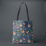 Gremlins™ 80's Retrowave Pattern トートバッグ<br><div class="desc">Bring the party (and the chaos) with this vibrant Gremlins™ all-over pattern design! Featuring fan-favorite characters Gizmo and Stripe in playful poses alongside retro TV screens, popcorn, soda cups, planes, and colorful confetti accents, this artwork captures the mischievous, movie-night energy fans adore. Set against a bold blue background with bright...</div>