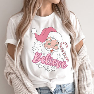 Groovyヴィンテージピンクサンタクロース信じクリスマス Tシャツ
