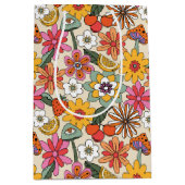 Groovy 70s、オレンジ、ピンク、グリーンフローラ ミディアムペーパーバッグ (正面)