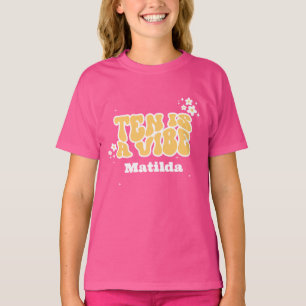 groovy rainbow tenはvibe 60のレトロなデイジー クール tシャツ