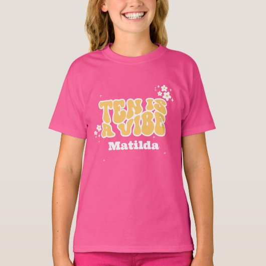 groovy rainbow tenはvibe 60のレトロなデイジー クール tシャツ (正面)