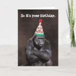 Grumpy Gorilla in Party Hat Birthday カード<br><div class="desc">This funny birthday card features a male gorilla with his arms crossed and wearing a birthday hat. The cover text says "So it's your birthday." The text inside says "Yay." All of the text is fully customizable.</div>