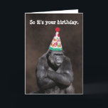 Grumpy Gorilla in Party Hat Birthday カード<br><div class="desc">This funny birthday card features a male gorilla with his arms crossed and wearing a birthday hat. The cover text says "So it's your birthday." The text inside says "Yay." All of the text is fully customizable.</div>