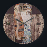 Gustav Klimt's The Three Ages of the Woman ラージ壁時計<br><div class="desc">Time slows when art speaks to the heart. This Klimt-inspired wall clock wraps your space in warmth, love, and meaning, turning every glance into a quiet moment of calm. Golden Art Nouveau details elevate your home while reminding you what truly matters—connection, beauty, and time well spent.</div>