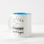 Guzhengプレイヤーに気づかれやすい好奇心の猫 ツートーンマグカップ (正面左)