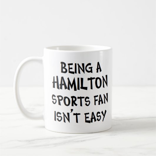 hamilton sports fan, being コーヒーマグカップ (左)