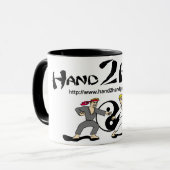 Hand2Handのマグ マグカップ (正面左)