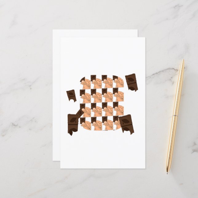 Hand holding a piece of Valentine's chocolate (正面/裏面インサイチュ)