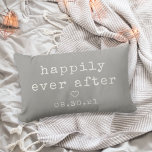 Happily Ever After | Custom Wedding Date ランバークッション<br><div class="desc">Create a sweet keepsake with our neutral grey pillow featuring "happily ever after" in soft ivory vintage typewriter lettering. Personalize with a wedding or anniversary date for a perfect gift for newlyweds or your favorite couple. A small heart in the center completes the design.</div>