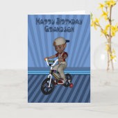 Happy Birthday Grandson, Boy on a bicycle カード (黄色い花)