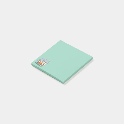 Happy Cat on top of a Book Stack Green ポストイット (アングル)