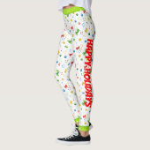 Happy Holidaysクリスマスリボンとミュージックノート レギンス (左)