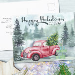 Happy Holidays New Home Vintage Red Truck Forest シーズンポストカード<br><div class="desc">Happy Holidays from our New Home Holiday Moving Announcement Card. Attractive design with misty watercolor forest, vintage red truck, christmas tree with lights, a stack of gifts and festive calligraphy.The template is ready for you to personalize with your new address and you can also edit "our New Home" to "my...</div>