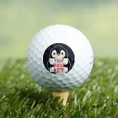Happy penguin holding a sign to personalize ゴルフボール (インサイチュ 木)