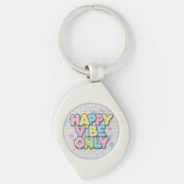 「Happy Vibe Only」とカラフルな文字が書かれたレンガ キーホルダー