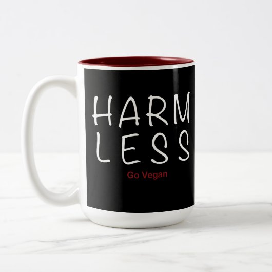 Harm Less – 移動ビーガン(ライトバージョン) ツートーンマグカップ (左)