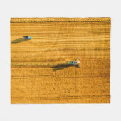 Harvester machine working in field. Combine harves フリースブランケット (正面(横))