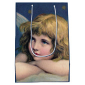 Heavenly angel daydreaming on a cloud in the sky ミディアムペーパーバッグ (裏面)