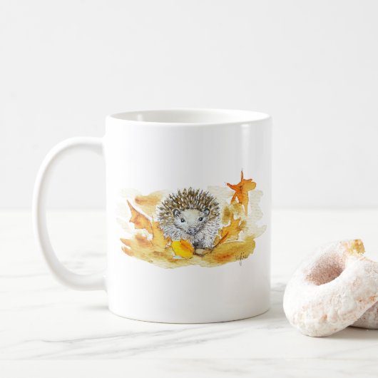 Hedgehog In Fall Leaves コーヒーマグカップ (ドーナツ)