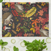 Hedgehogs and autumn forest flora on black キッチンタオル (折り畳み)