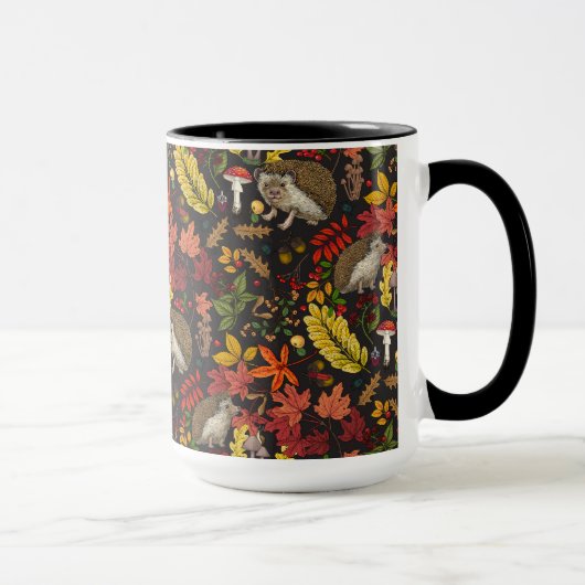 Hedgehogs and autumn forest flora on black マグカップ (右)