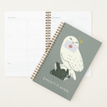 Hedwig With Letter Whimsical Drawing プランナー手帳<br><div class="desc">Deliver a little magic with this charming Hedwig illustration inspired by the wizarding world. Perched atop a stack of spellbinding textbooks labeled Potions and Herbology, Hedwig proudly holds a sealed Hogwarts™ letter. The soft, minimalist style and muted tones give this design a cozy, storybook feel, while subtle sparkling accents add...</div>