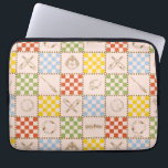 HOGWARTS™ QUIDDITCH™ Team Checker Pattern ラップトップスリーブ<br><div class="desc">Celebrate the magic of the wizarding world with this charming checkered icon pattern design. Featuring a playful patchwork of house-inspired colors, broomsticks, magical balls, crests, and other wizarding symbols, this all-over print blends classic charm with whimsical detail. The alternating checkerboard layout gives the design a cozy, quilt-like feel, while the...</div>