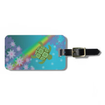 Honuのウミガメの熱帯水泳の虹および花