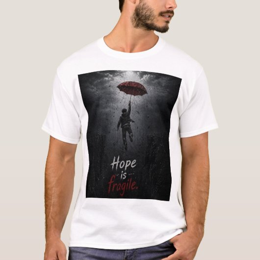 “Hope Is Fragile: Holding On While Everything Fall Tシャツ (正面)