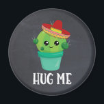 Hug Me Cactus in a Sombrero on Black Chalkboard マグネット<br><div class="desc">Hug me magnet with a cute illustration of a green cactus sitting in a flower pot. Big kawaii eyes and wearing a red sombrero. Background is a black chalkboard image.</div>